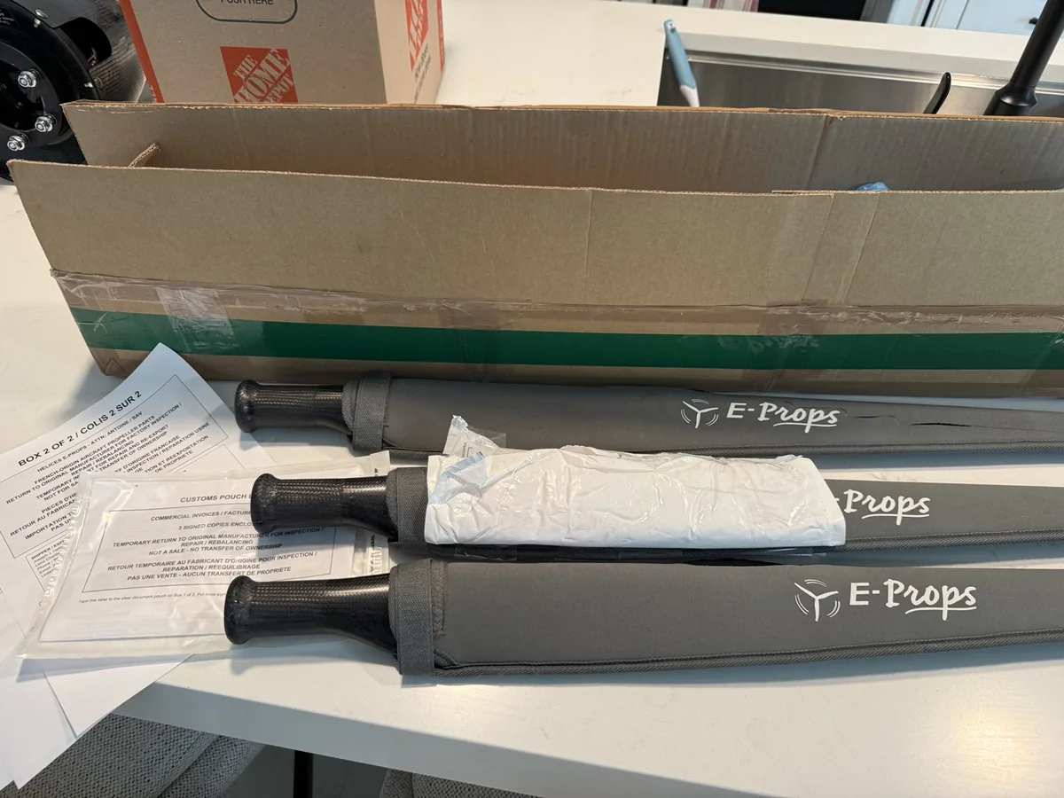 E-PROPS blades, shipping box, and customs paperwork used for documented U.S. propeller support