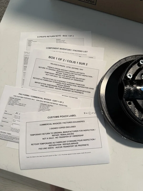 E-PROPS customs documents and spinner assembly
