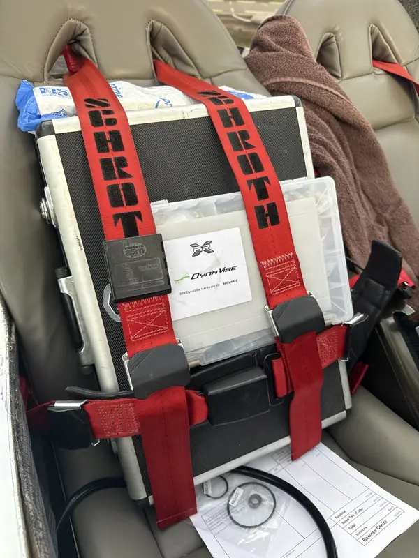 DynaVibe equipment secured inside an aircraft for transport to the airfield