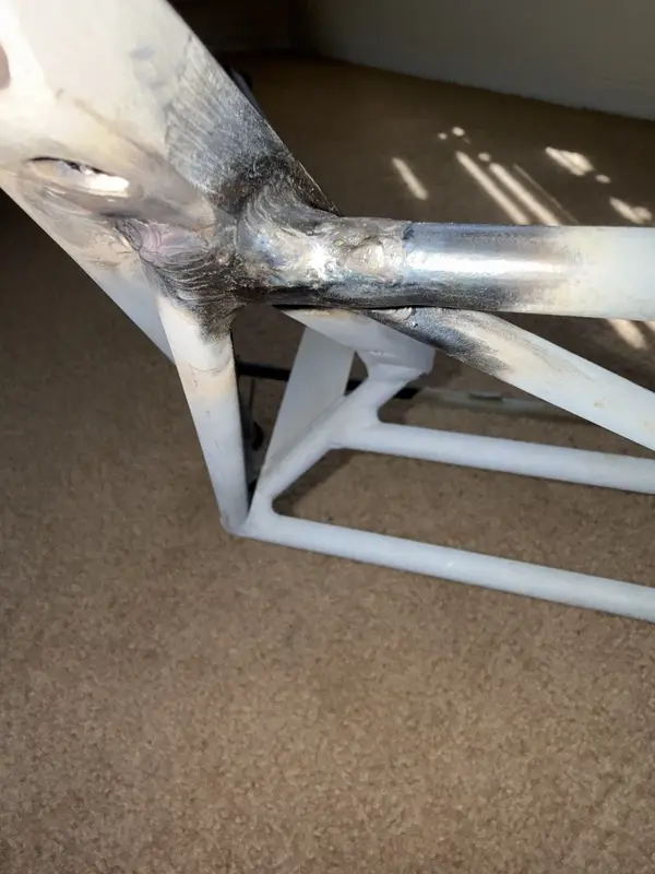 Detailed view of coordinated engine cage weld work
