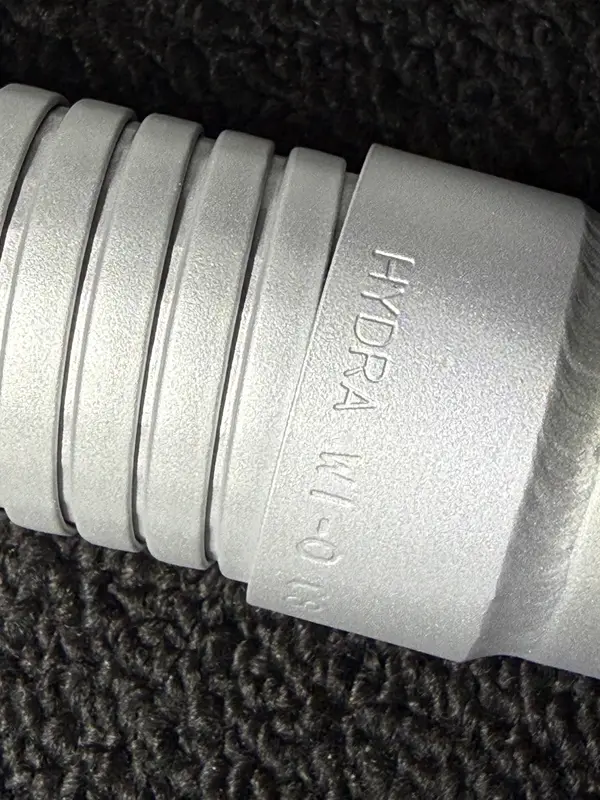 Manufacturer marking detail on an aircraft exhaust component