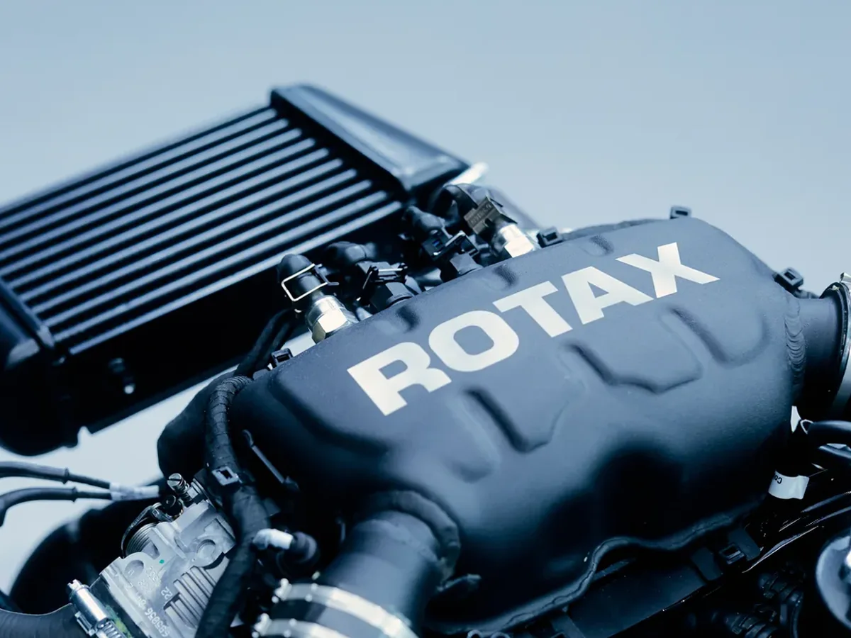 Focused Rotax airbox and induction detail on a light-sport aircraft engine